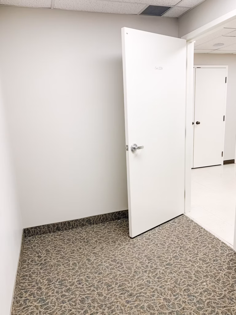 Open white door to