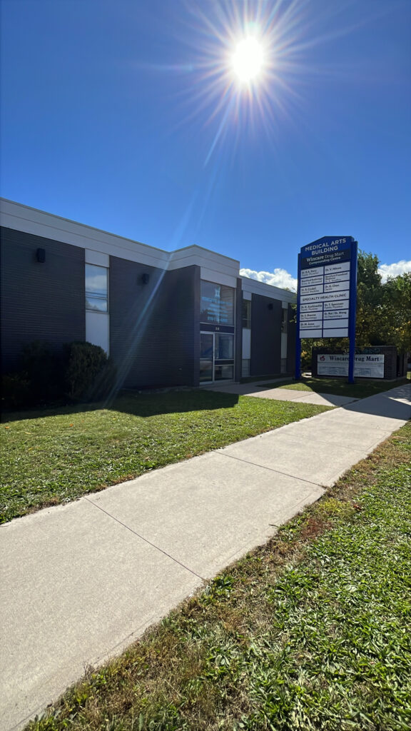Exterior of Brant Medical Professional Centre at 353 St. Paul Avenue in Brantford, showing the entrance, lawn and roadside sign.
