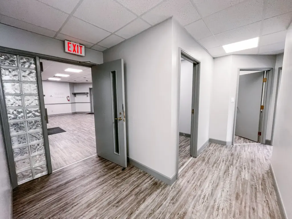 Hallway linking reception and private rooms in Suite 106B at 353 St. Paul Avenue, Brantford.