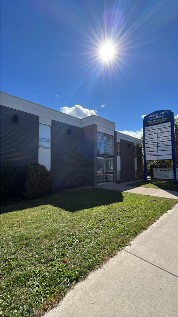 Exterior of Brant Medical Professional Centre at 353 St. Paul Avenue in Brantford, with lawn, walkway and tenant signage.