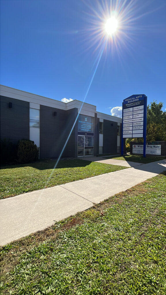 Exterior of Brant Medical Professional Centre at 353 St. Paul Avenue in Brantford, with lawn, walkway and tenant signage.